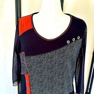 dress in solids and prints of black and orange. Size XL